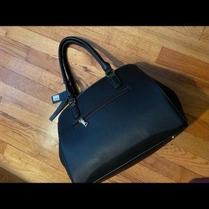 Purse -Black brand new with tags. Faux leather
